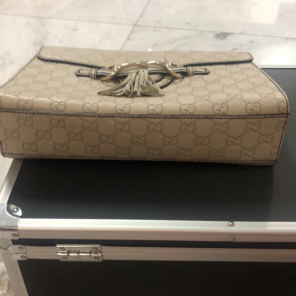 Ivory Gucci authentic bag. NWOT. This is the latest Gucci trending bag. - Picture 12 of 14